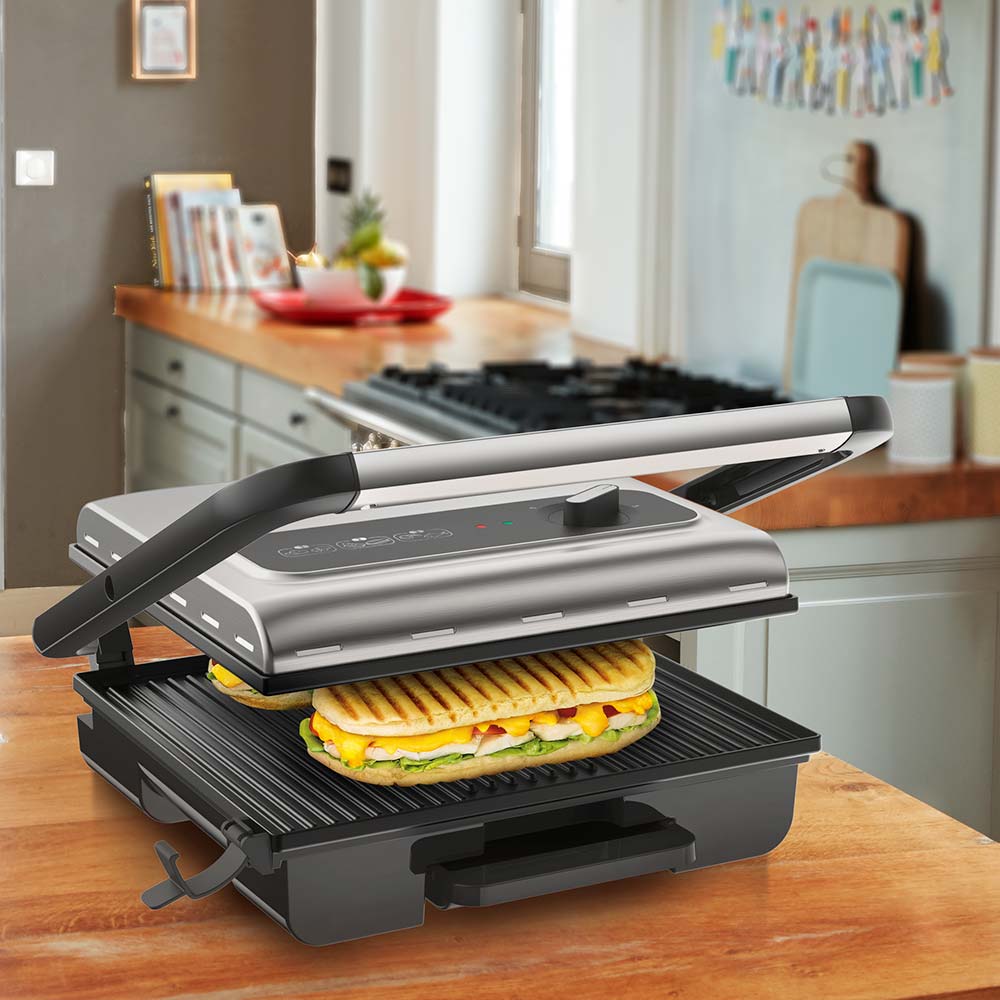 sandwich in a grill press on the kitchen counter - Robins Kitchen