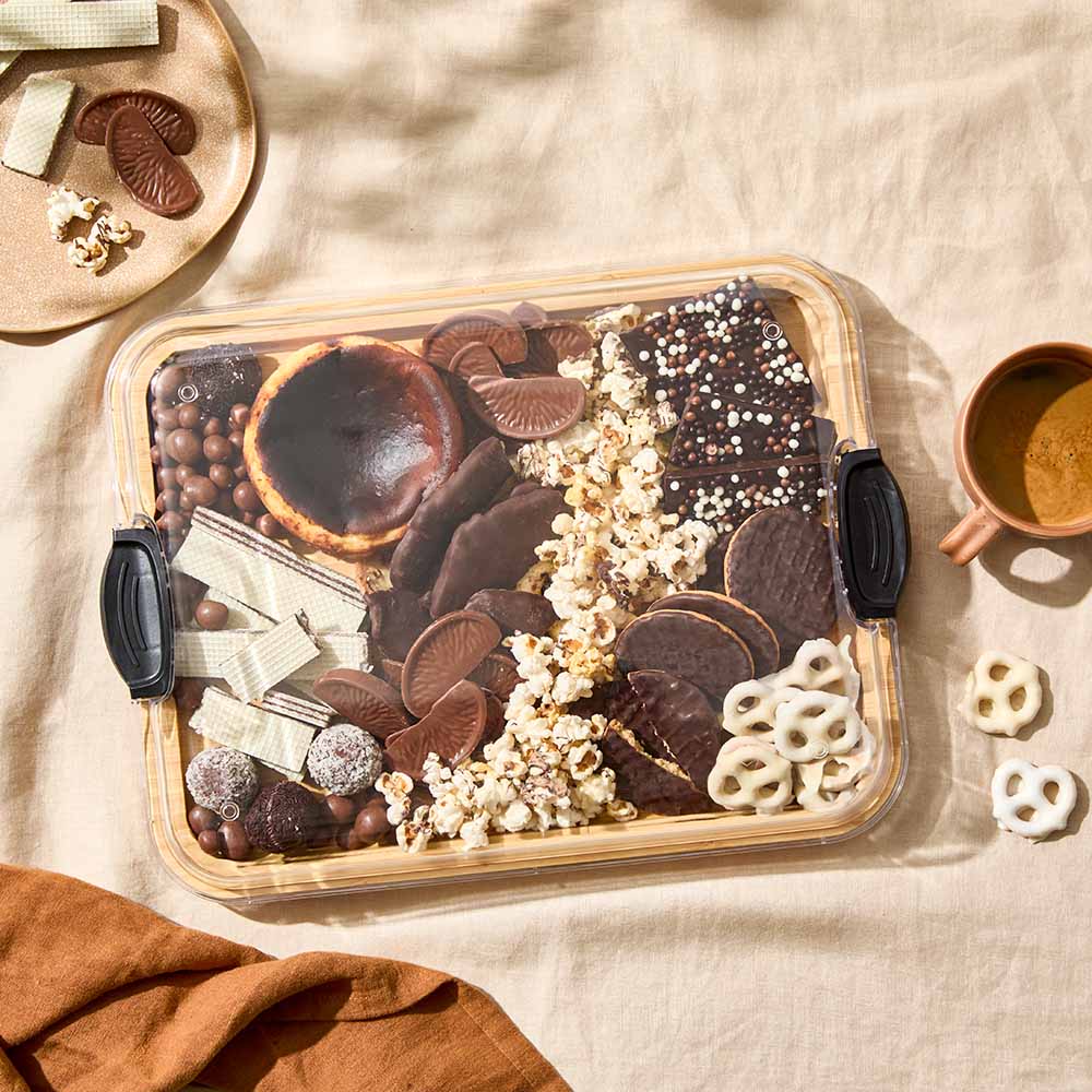 Rectangular Grazing Travel Board with lid filled with chocolate sweets