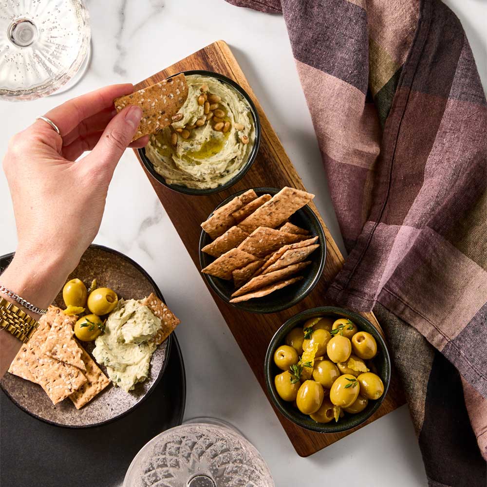 Serving Board with 3 Green Bowls with dip, olives, and crackers - Robins Kitchen