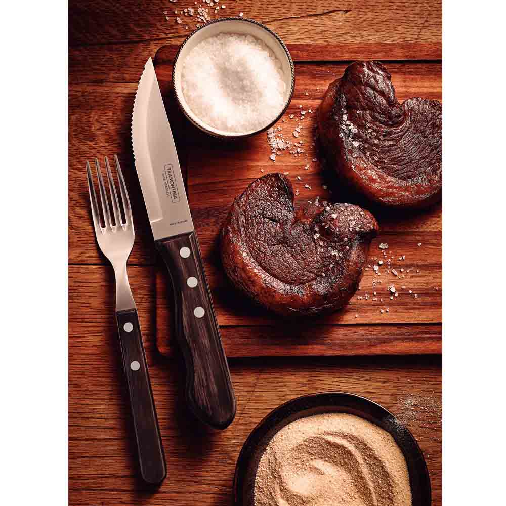 steak knife and fork set with side of steaks on wooden board - Robins kitchen