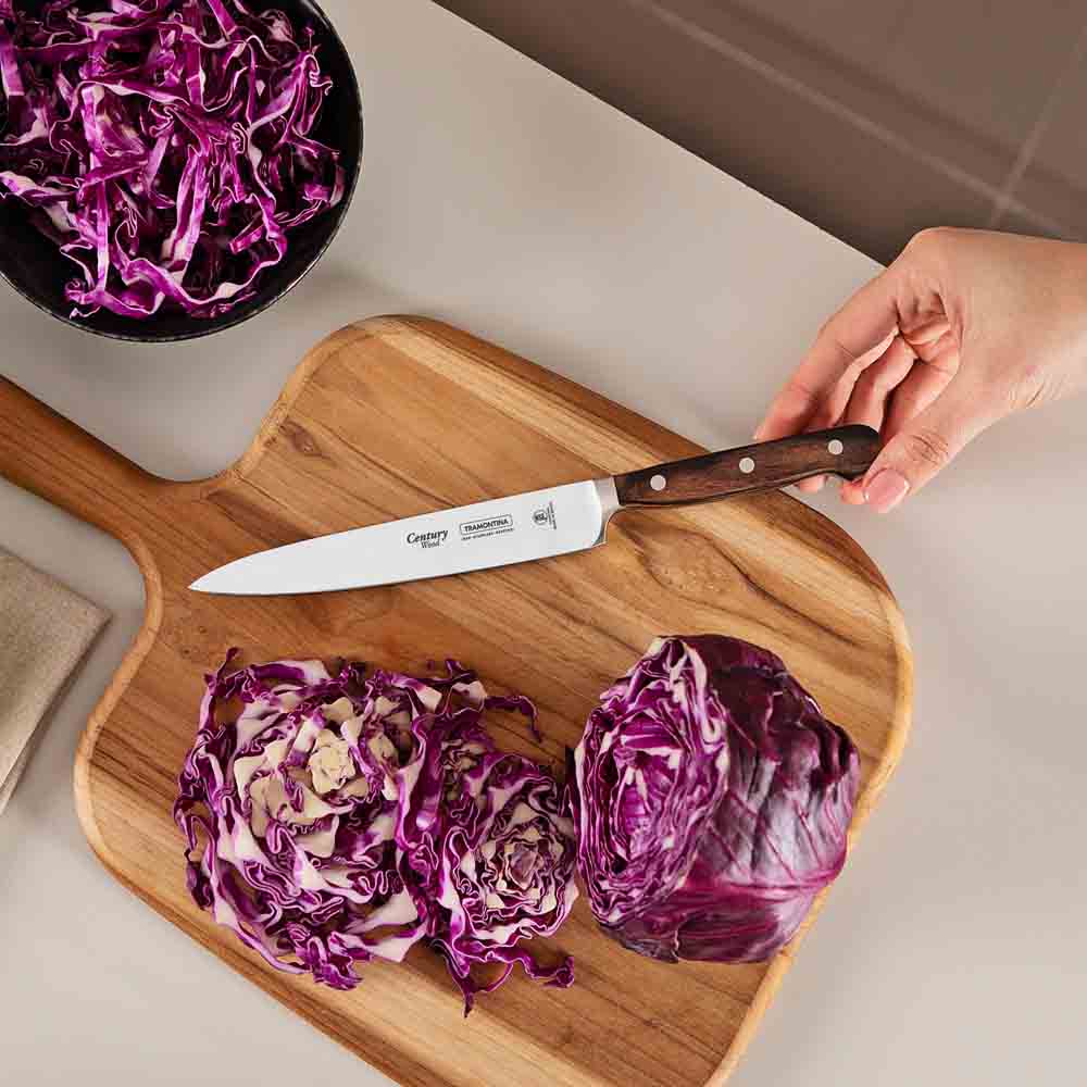 woman chopping cabbage with Utility Knife - Robins Kitchen